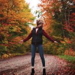Woman in Autumn leaves