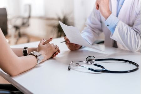 Dr and patient (hands view only)
